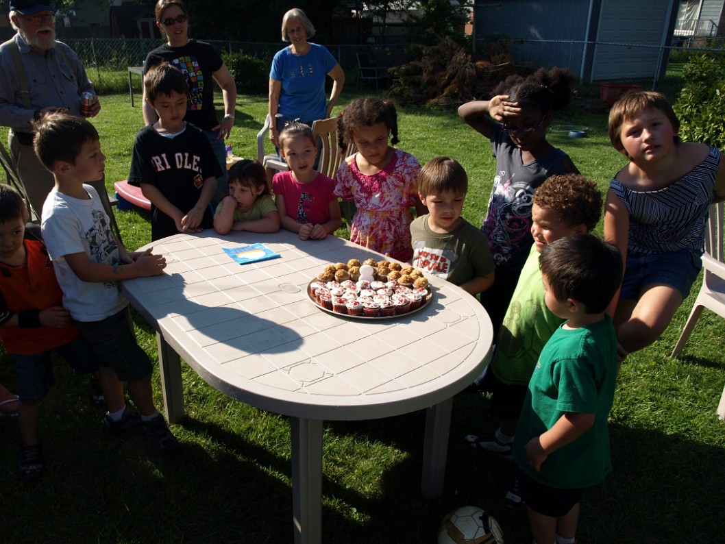 Gathering Around the Birthday Cupcakes and Muffins Gathering Around the Birthday Cupcakes and Muffins