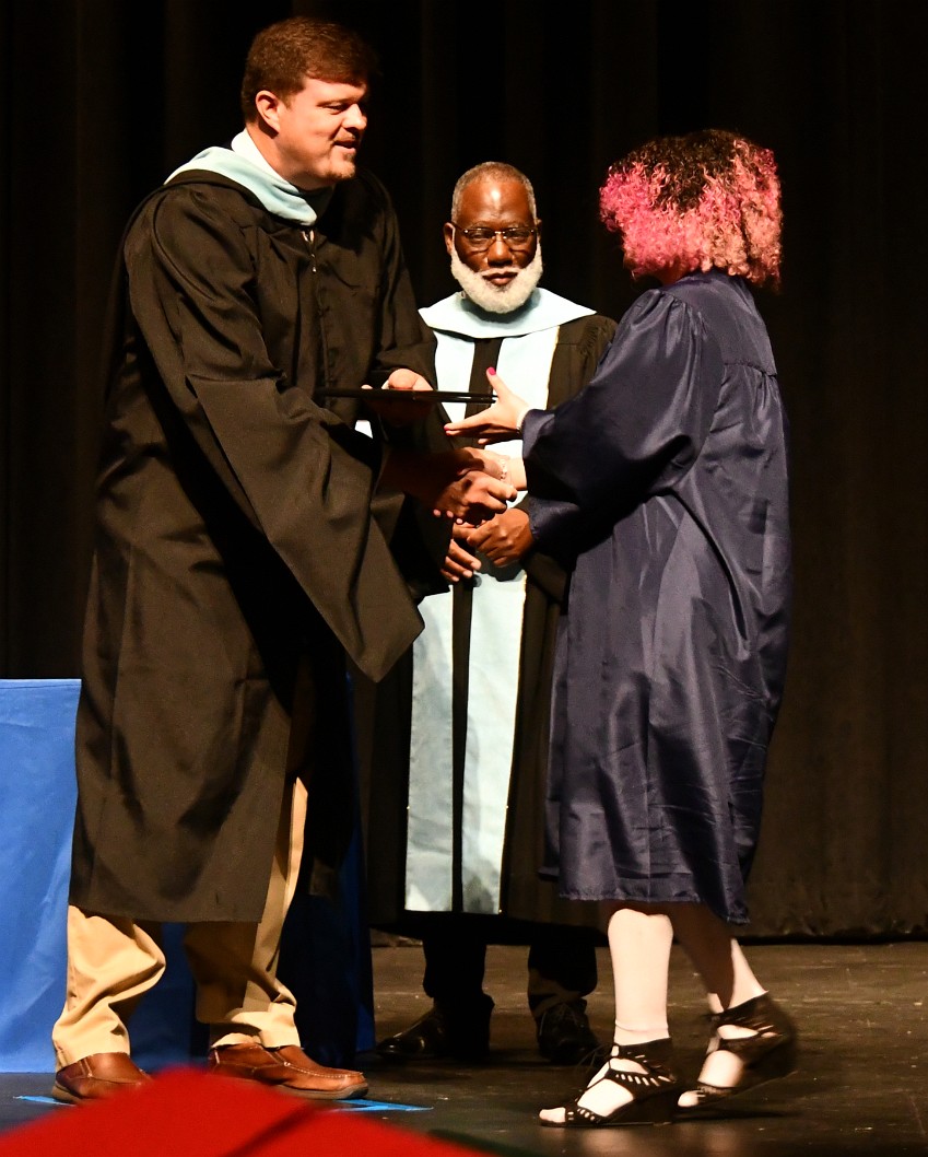 Accepting the Diploma