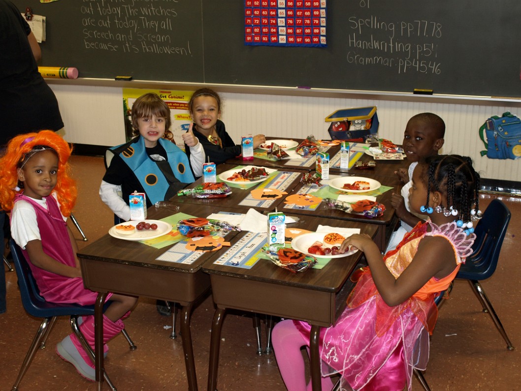 Enjoying a Meal With Her Classmates Enjoying a Meal With Her Classmates