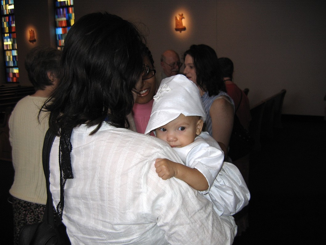 Peeking Over Moms Shoulder in His Baptism Outfit Peeking Over Moms Shoulder in His Baptism Outfit